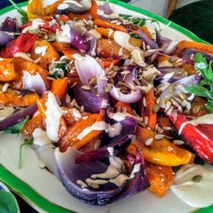 A picture of Autumn rainbow vegetable salad with tahini dressing.
