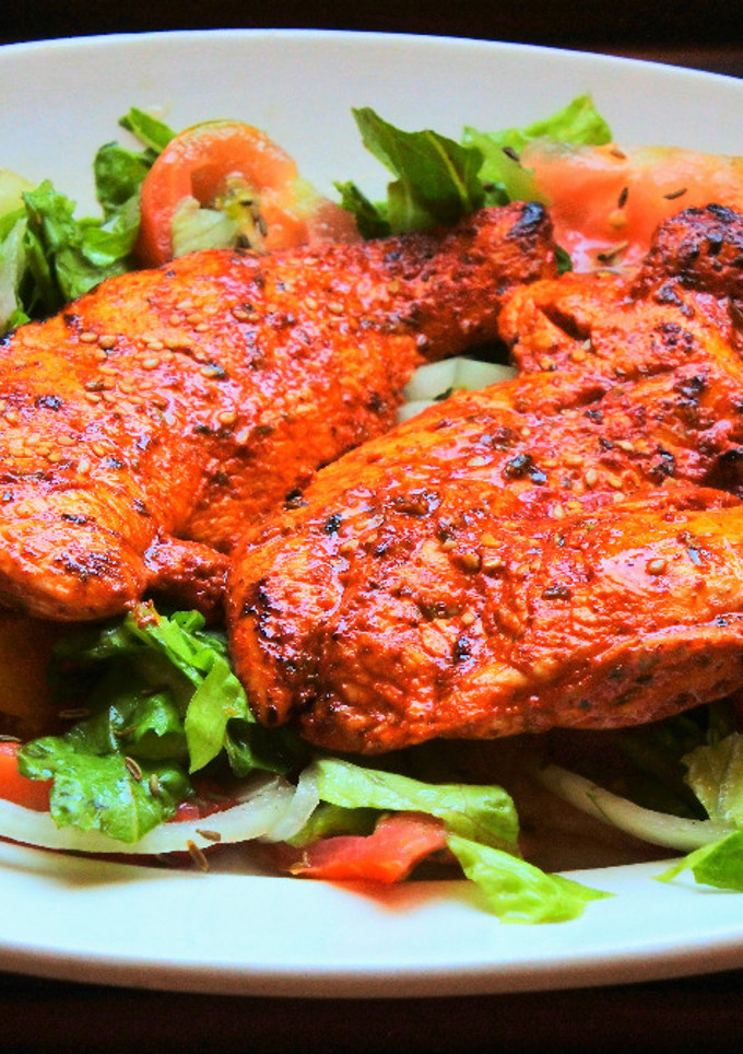 Una foto de Pollo marinado con achiote