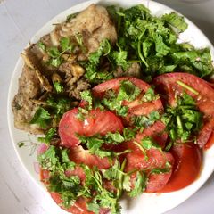 A picture of Pollock with fresh veg.side dish.