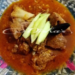 A picture of Raw Mango Mutton Curry.