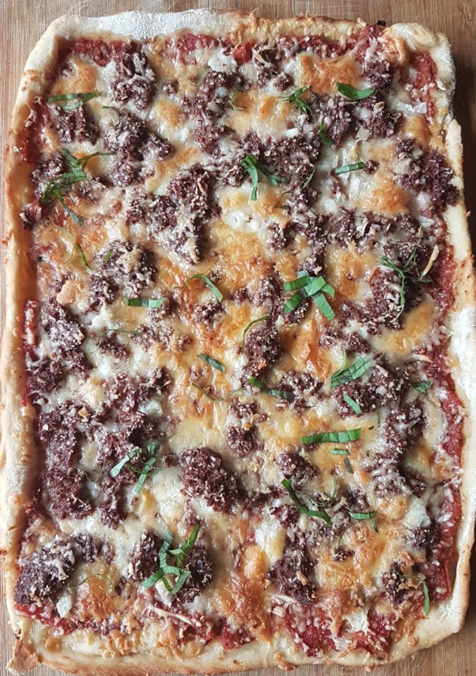 Una foto de Pizza de res enlatada