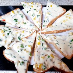 A picture of My Soft Cheese, Sweet Pepper + Chopped Chives Spread on toast 😁.