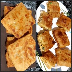 A picture of Chicken cheese baida roti.
