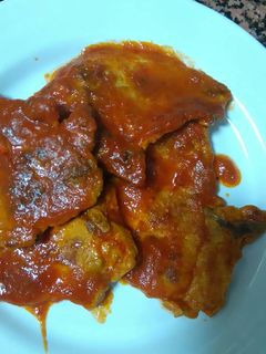 Una foto de Chuletas de cerdo con tomate