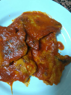 Una foto de Chuletas de cerdo con tomate