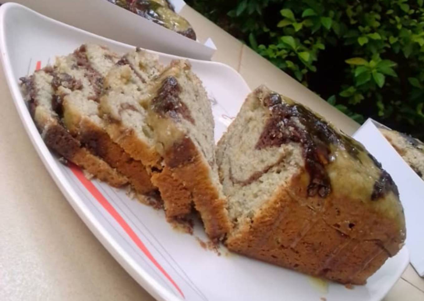Chocolate x citrus banana swirl loaf with citrus glaze