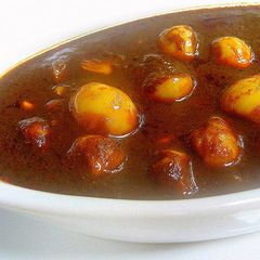 A picture of Poondu kulambhu.