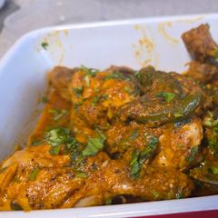 A picture of Masala chicken drumsticks.