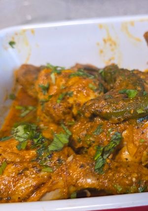 A picture of Masala chicken drumsticks.