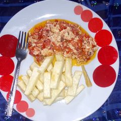 A picture of Fried yam and Egg sauces.
