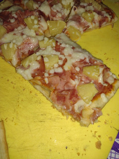 Una foto de Pizza hawaiana