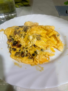 Una foto de Tortilla de calabacín y jamón ibérico