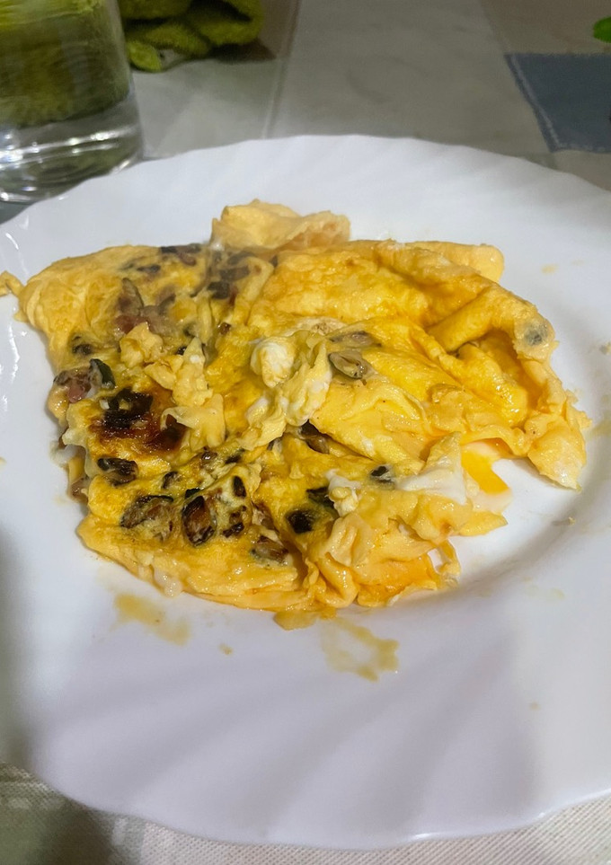 Una foto de Tortilla de calabacín y jamón ibérico