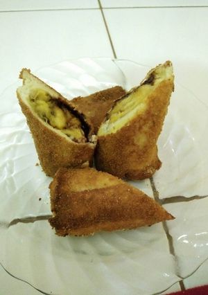 Foto resep Roti Gulung Isi Pisang Keju Coklat
