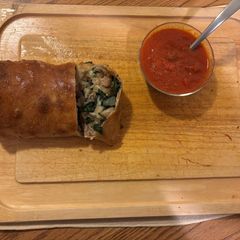 A picture of Sausage Stromboli with spinach, mushrooms & onions.