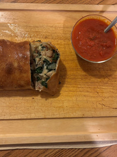 A picture of Sausage Stromboli with spinach, mushrooms & onions.