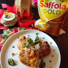 A picture of Cheesy swiss roll pakoda.