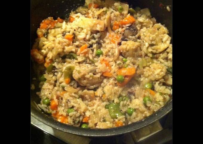Riz sauté aux légumes (carottes petits pois champignons haricots plats)