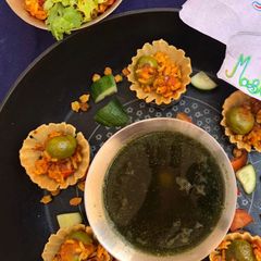 Puff rice upma in tart with phudina pani A picture of Puff rice upma in tart with phudina pani.
