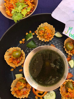 A picture of Puff rice upma in tart with phudina pani.