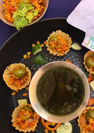 A picture of Puff rice upma in tart with phudina pani.