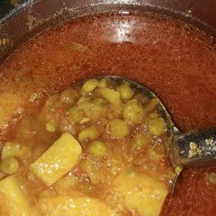 A picture of Aloo matar gravy veg.