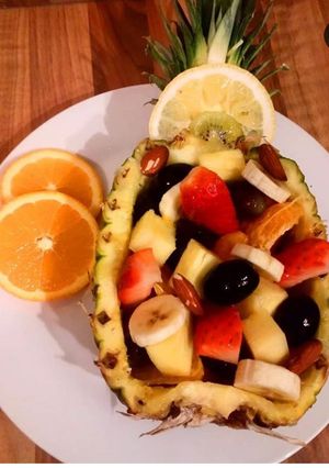 A picture of Pineapple bowl fruit salad.