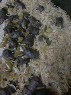 صورة لوصفة طاجن الارز البسمتي بالسجق البلدي