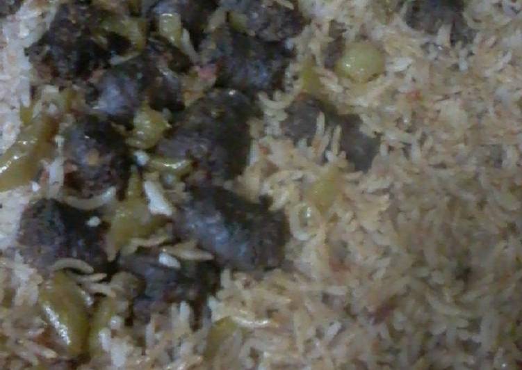 طاجن الارز البسمتي بالسجق البلدي