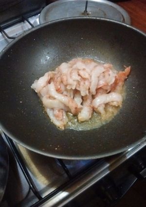 Una foto de Langostinos salteados en toque de sésamo al work