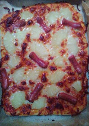 Una foto de Pizza de Frankfurt y piña