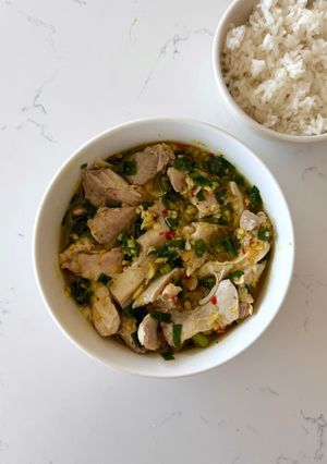 A picture of Steamed Chicken with Ginger Scallion Oil.