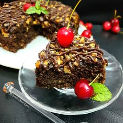 A picture of Oatmeal Walnut & Chocolate Brownie Cake Eggless.