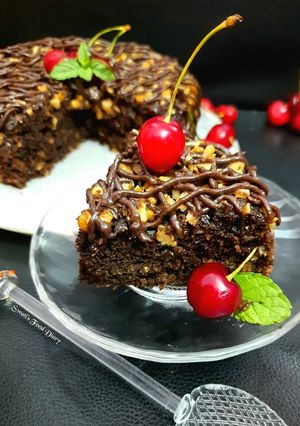 A picture of Oatmeal Walnut & Chocolate Brownie Cake Eggless.