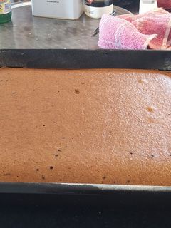 Una foto de Bizcochuelo de chocolate sin huevo, sin leche y sin manteca rectángular