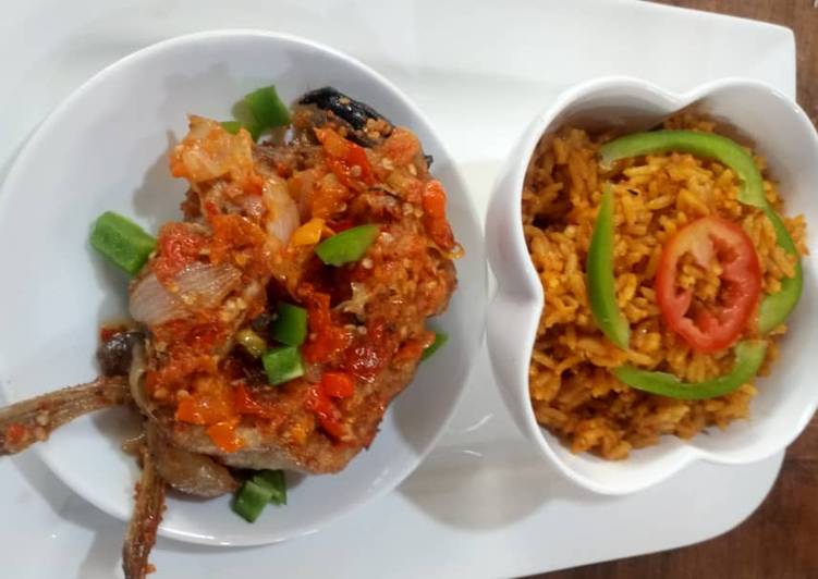 Jollof rice with cat fish pepper sauce