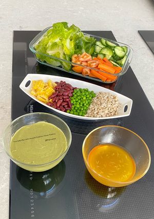 A picture of Mini Salad Bar With Avocado Dressing & Honey Dressing.