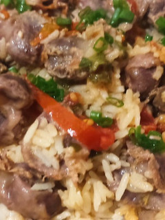 Una foto de Arroz con molleja de pollo