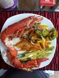 Langosta con vegetales