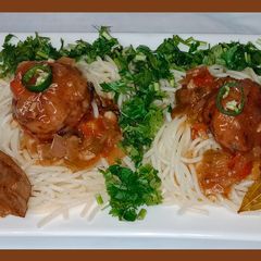 Slurry meatballs with garlic fried spaghetti A picture of Slurry meatballs with garlic fried spaghetti.