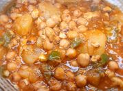 Una foto de bacalao con garbanzos