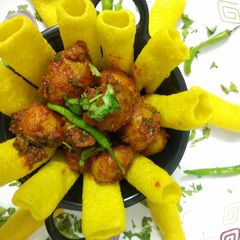 A picture of Lasaniya Aloo With Yellow Bhungra.