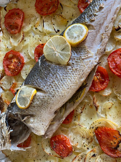 Una foto de Lubina al horno