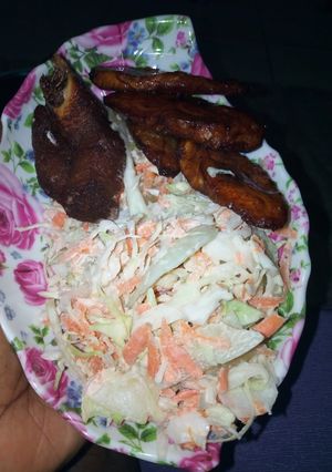 A picture of Coleslaw Salad with Plantain and Meat.