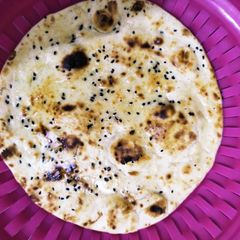 A picture of Buttery tawa naan.