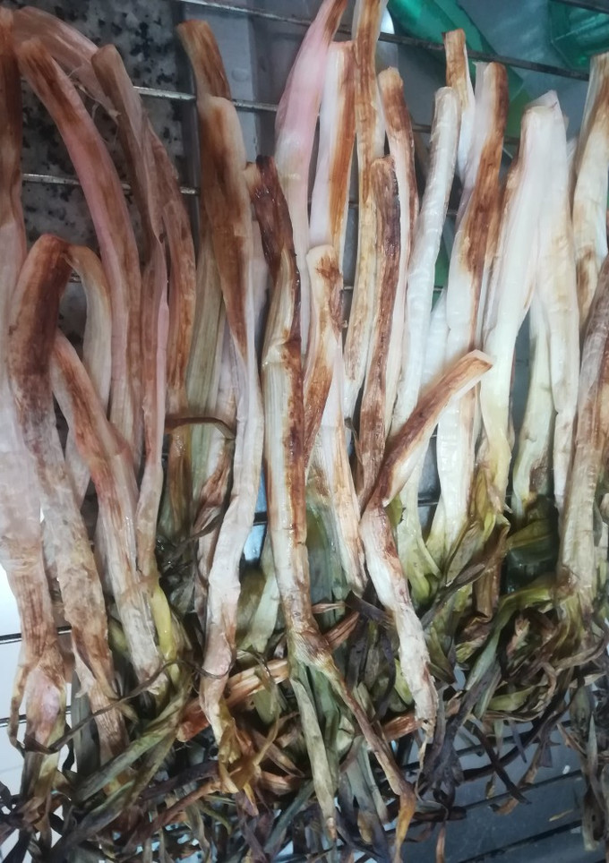 Una foto de Calçots