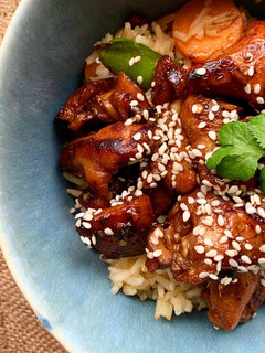 A picture of Korean style sticky chicken (with veggie rice).