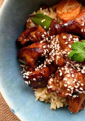 A picture of Korean style sticky chicken (with veggie rice).