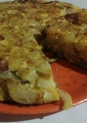 Una foto de Tortilla de papas con yapa