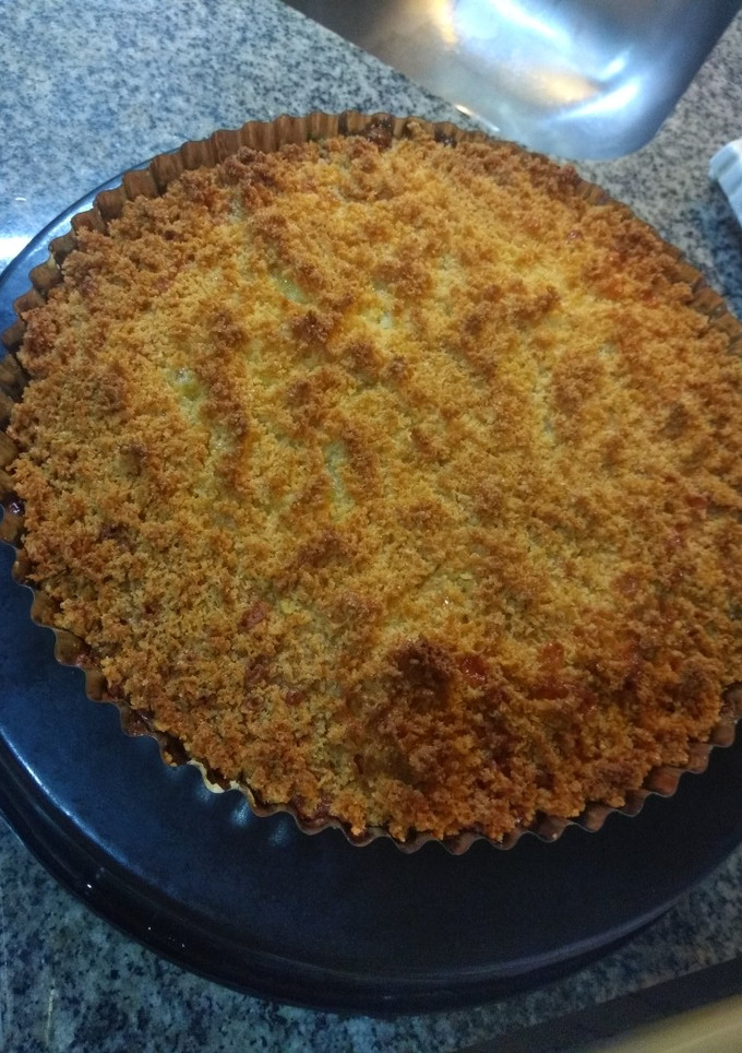 Una foto de Tarta de coco y dulce de leche clásica. Muy fácil elaboración!